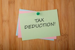 The word tax deductible on a sticky note, a blog about non-tax=deductible expenses